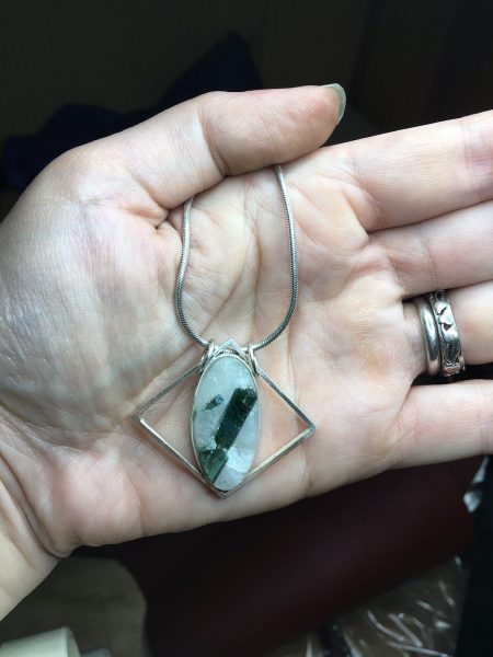 Geometric pendant with tourmaline in quartz